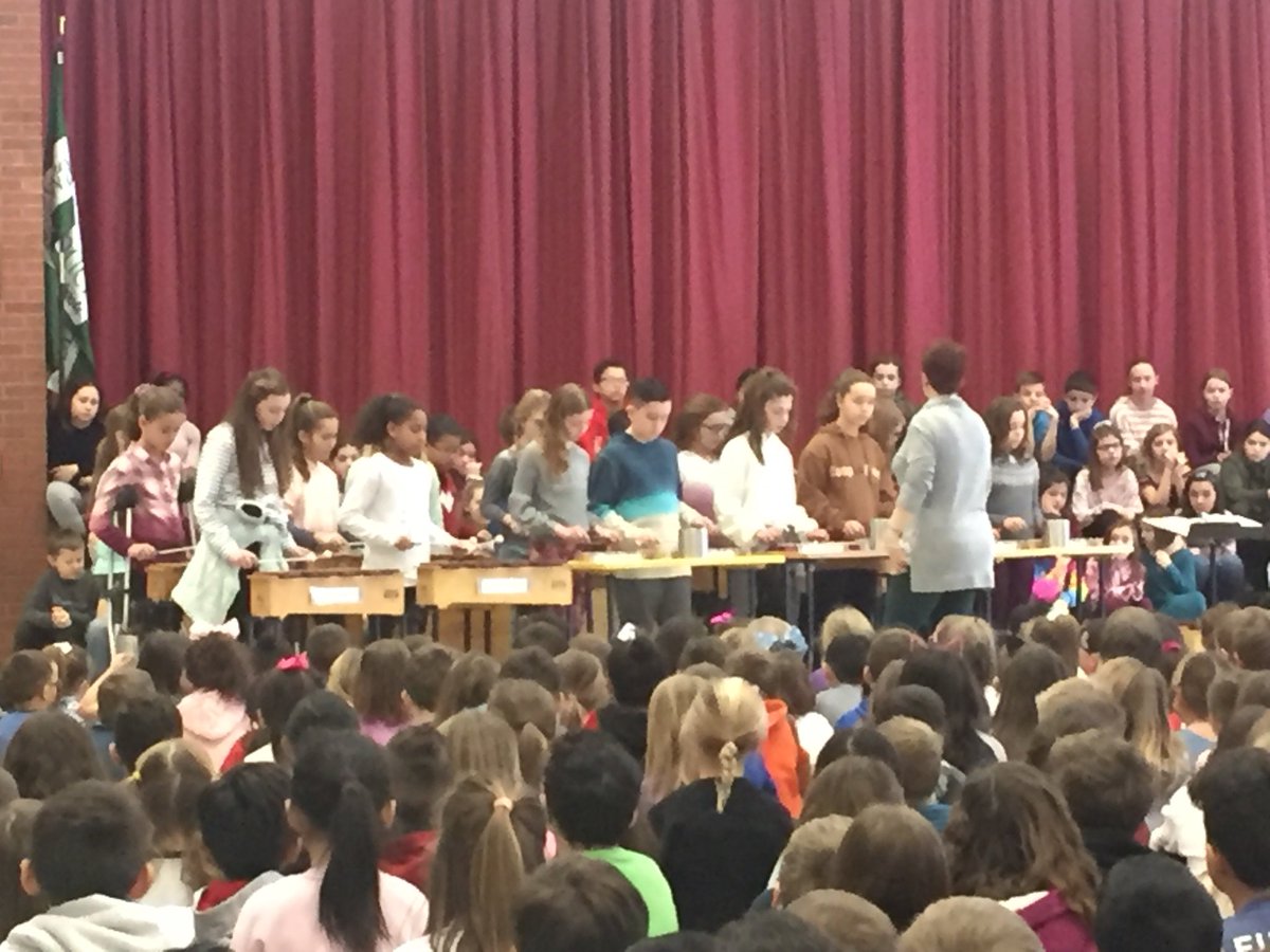 SkanoElementary's tweet photo. This morning, the #skanodolphin Chorus and Orff Ensemble performed in front of the whole school. Please join us tonight at 8:15 in the cafeteria for the full performance. https://t.co/tX7mRFn5Jb