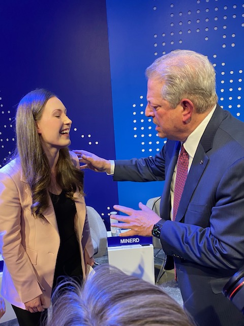 Al Gore greets Sanna Marin on stage at the World Economic Forum