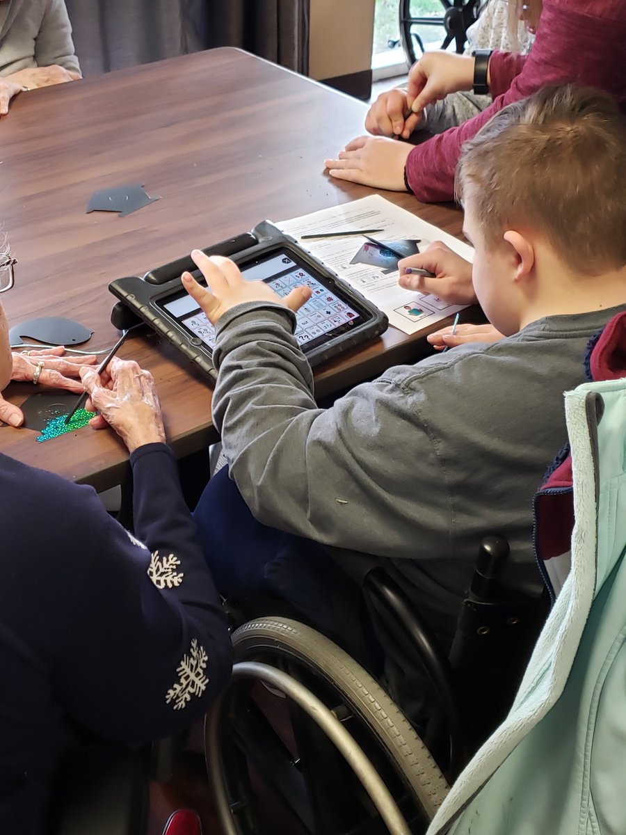 JamieWithering2's tweet photo. I love my job! ❤ Today was another awesome visit with our friends at the nursing home... my Ss using their AAC voices and conversing with residents! #PatinsIcam @jclambert33 @BeckyPina1 #AtChat https://t.co/Ob5320FVpF