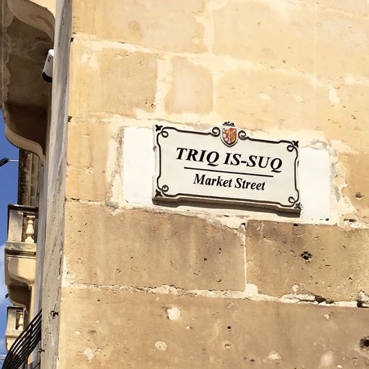 Here's some signs from Malta to illustrate how similar Maltese is to Arabic.This street sign, Tariq al-Suq, is exactly the same as it would be in Arabic - albeit written in Latin letters.