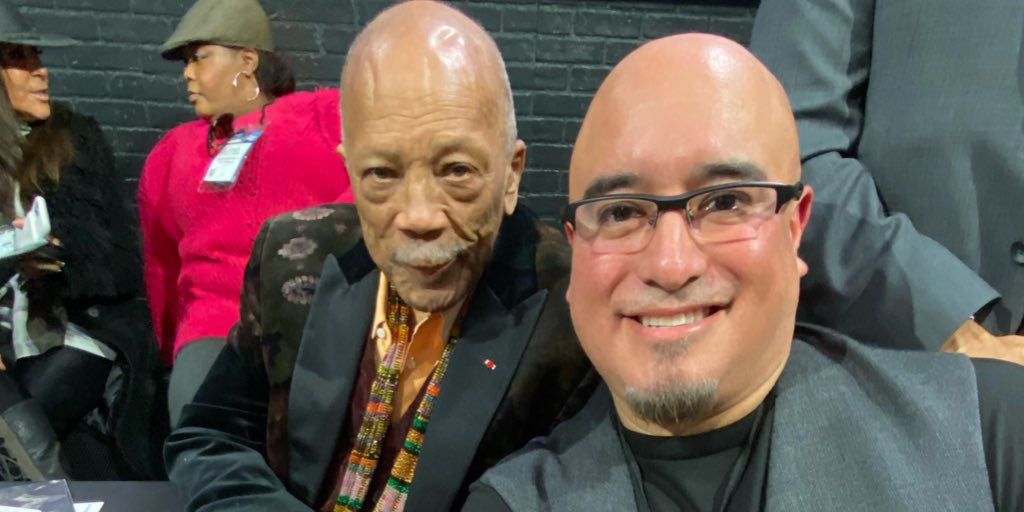 SmoothJazzAlley's tweet photo. Meeting Quincy Jones was definitely the highlight at NAMM!  Not just to get his autograph on my badge but to actually talk shop with him for 5 min was incredible.  (As if seeing him interviewed by Jimmy Jam wasn’t already great enough. ) #quincyjones #NAMM2020 #NAMMShow #NAMM https://t.co/zgA21tYhO1