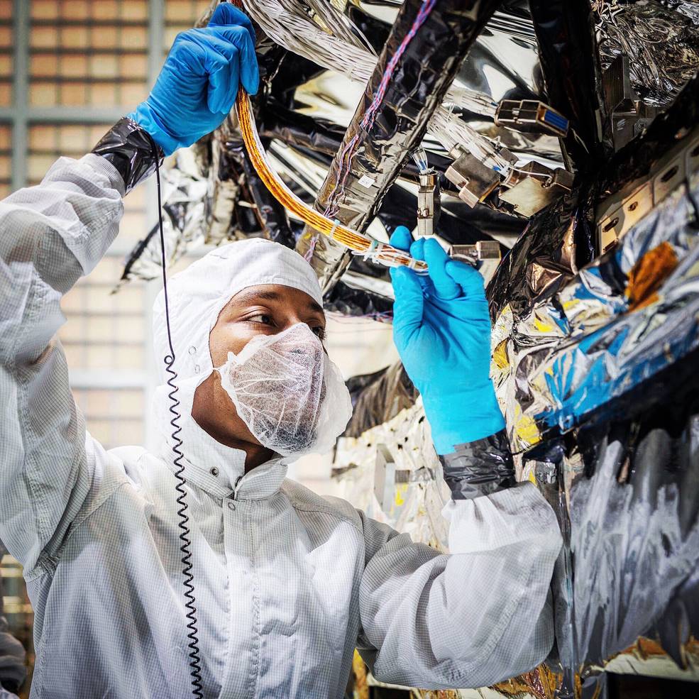 Kenneith Harris II, shown at work on the James Webb Space Telescope.  Credit: NASA Goddard/Chris Gunn