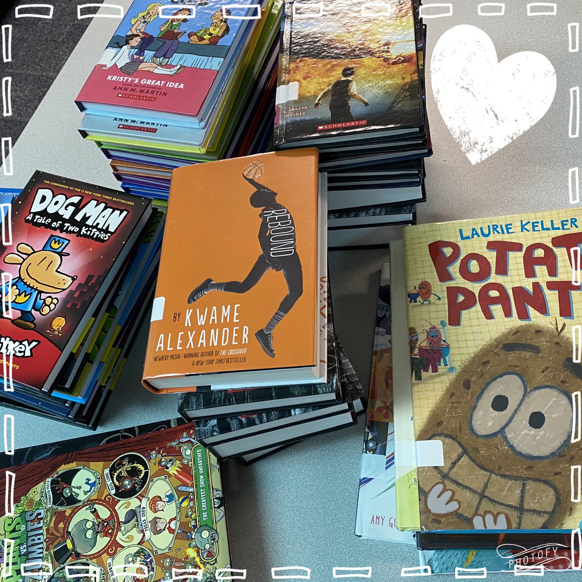 LESReading24's tweet photo. Stacks of new copies of books ready to shelve make for bunches of smiles! https://t.co/PQX6lI5AVr