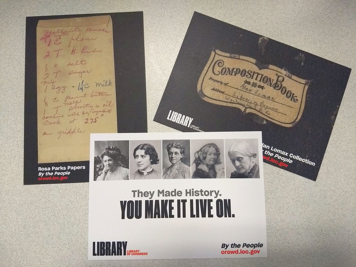 Photograph of By the People postcards promoting Library of Congress crowdsourcing of Rosa Parks, Alan Lomax, and women's suffrage collections