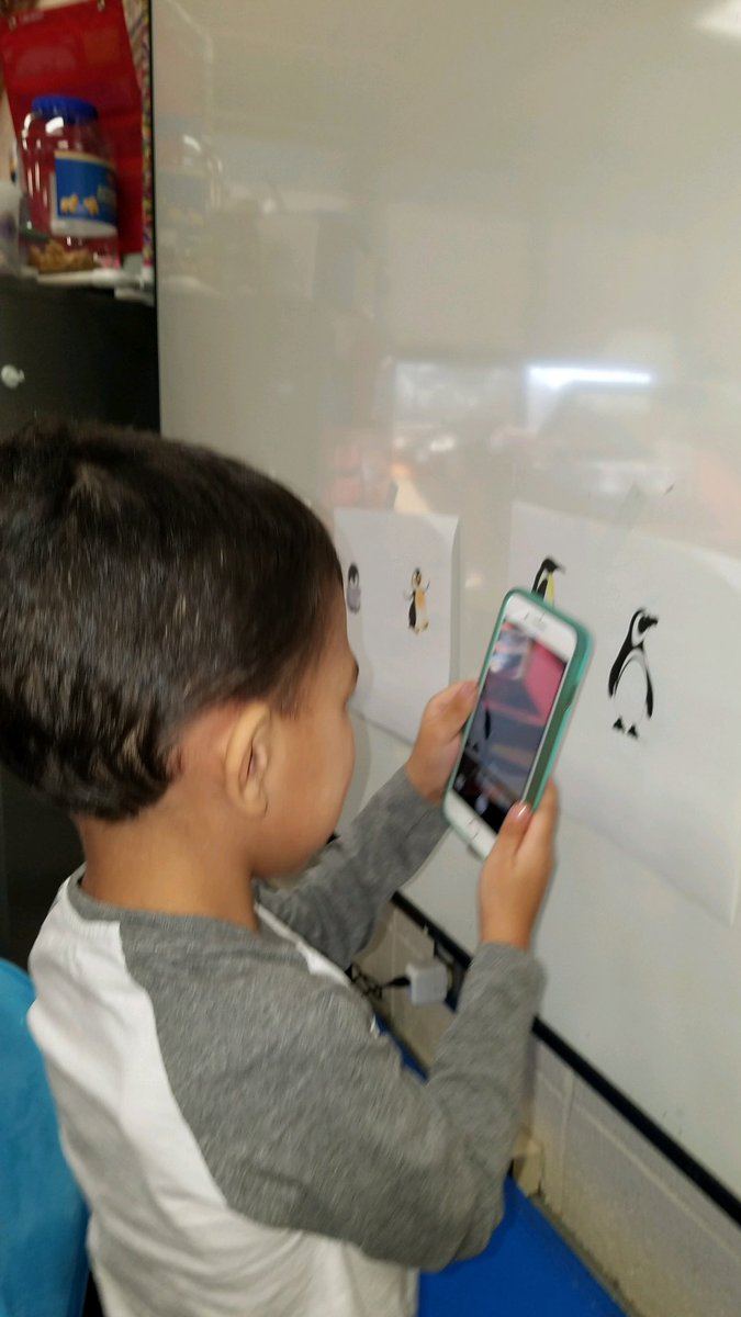 missavallone's tweet photo. Preschool took a picture of their favorite penguin to add to their iceberg! https://t.co/wgOjcBjbIz