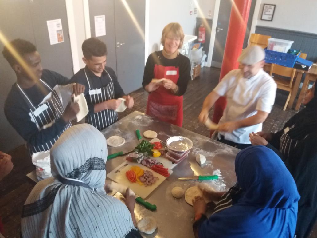 BelongInBelfast's tweet photo. Having fun stretching pizza dough here #GlobalkitchenNI on our first short course of 2020 and looking forward to lunch! @TNLComFundNI @commongroundsni @KellieFem https://t.co/UpKVKtRIWn