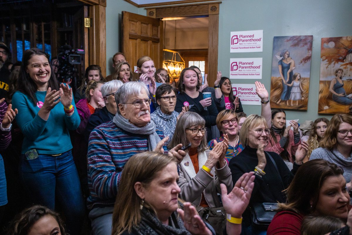 Supporters cheer Elizabeth Warren.
