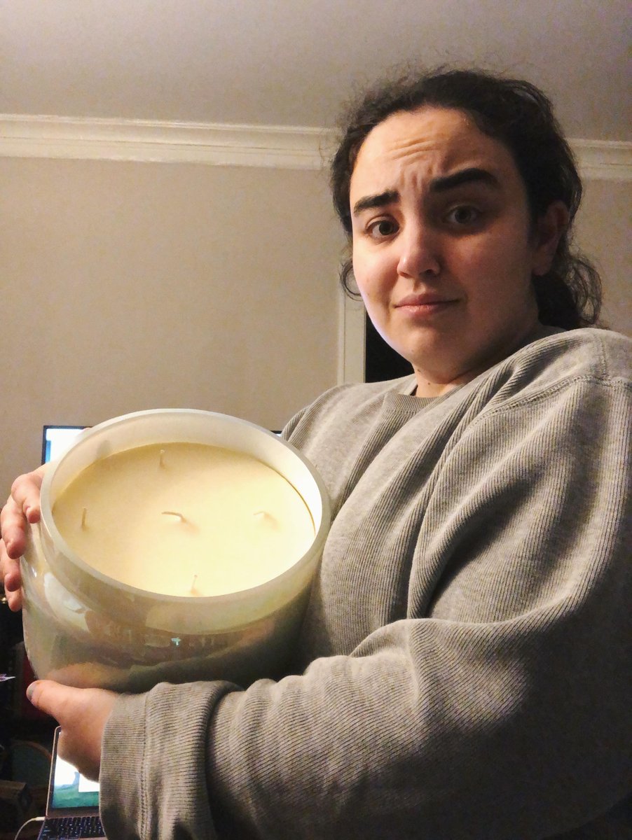 I sense that some of you aren't understanding fully how big a 12lb candle is. Here's me, not a small woman by any means, with this candle, for illustration purposes.