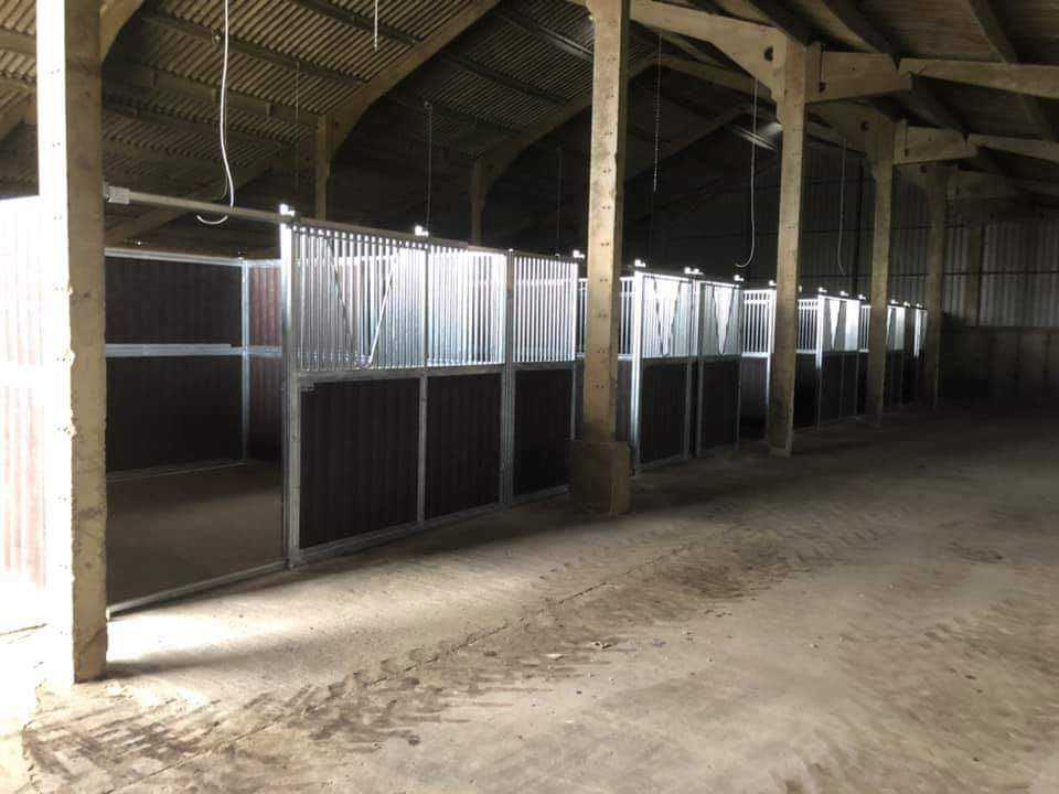 This weeks 24 stable installation near Eye Suffolk. 12 x Hybrid Curved Front Stables, 12 x Standard Range Sliding Door Front stables and 4 x wash bay/tack up areas. All with galvanised frames and recycled brown plastic boarding.#Stables #Horses #Equinehour #suffolk #looksawesome