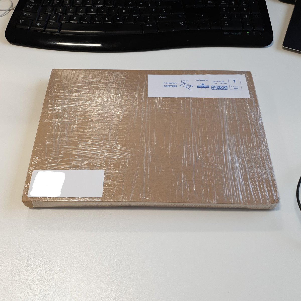 A picture of a brown box waiting to be opened