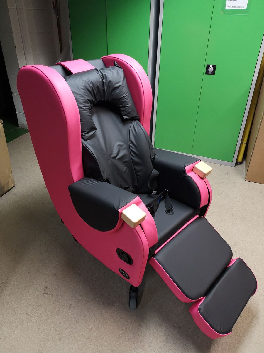 This vibrant Fushia <a href="/CareFlexSeating/">CareFlex Ltd</a> HydroTilt 330 is at HQ ready for delivery! Including the contoured back rest, soft profiled headrest, 2 point padded belt and it's been modified with a 75mm riser kit!