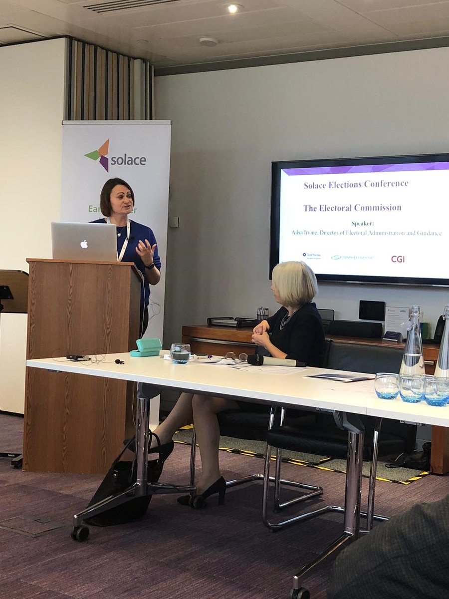 Our director of electoral administration and guidance speaking at an event