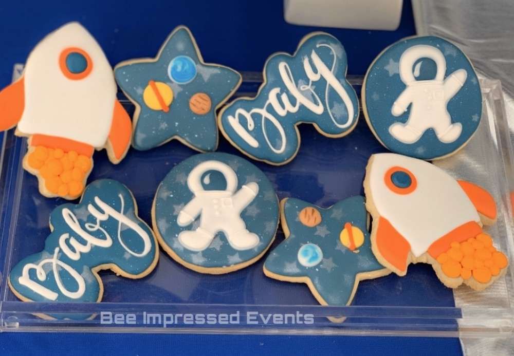 space themed baby shower cake