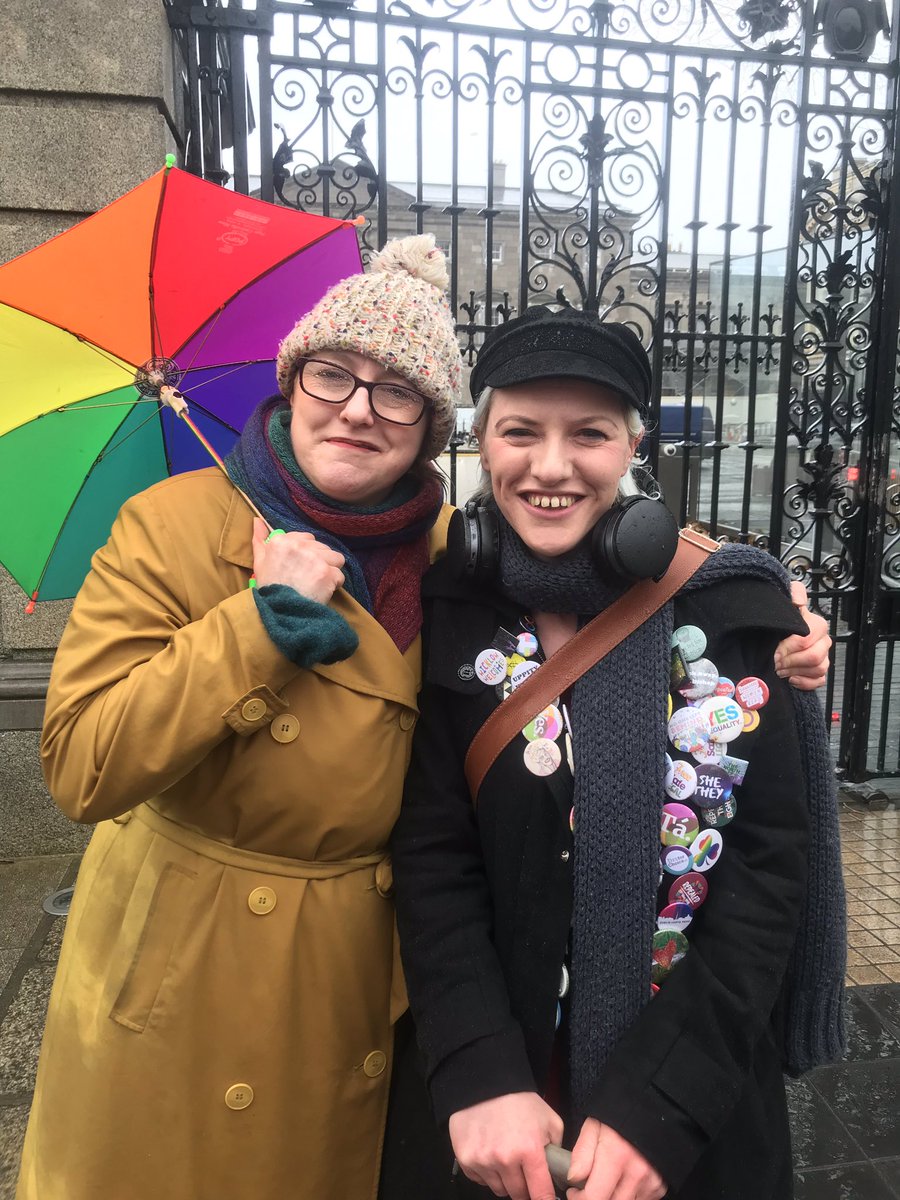aliceeire's tweet photo. Myself & @NemKearns with my very tiny umbrella as we caught the end of a wet but lovely @DubTrans rally in support of much-needed #genderrecognitonforall & legislation to support Trans & Intersex Rights. https://t.co/mdkh8DRaXJ