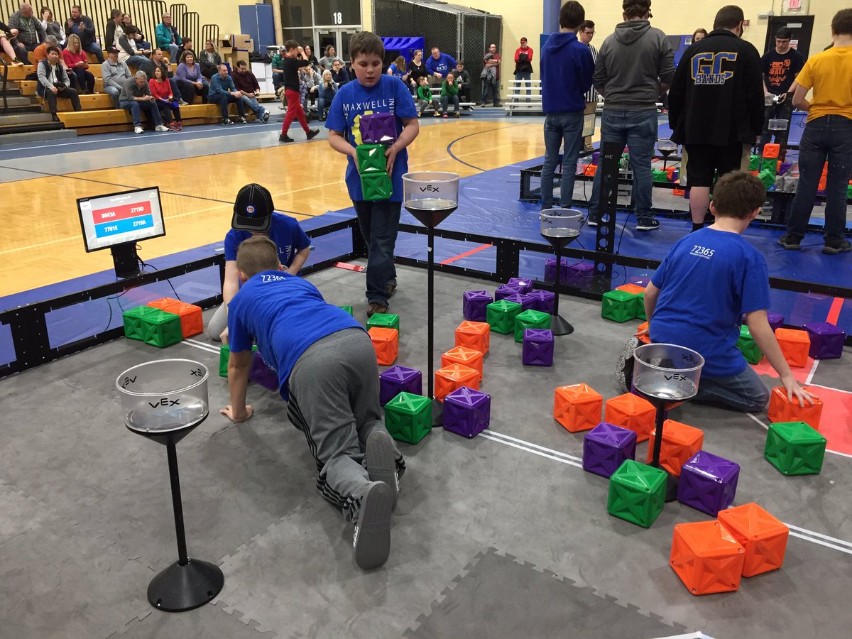 Maxwell VEX team members working hard to reset the fields at the GC high school robotics event. Great team building opportunity!