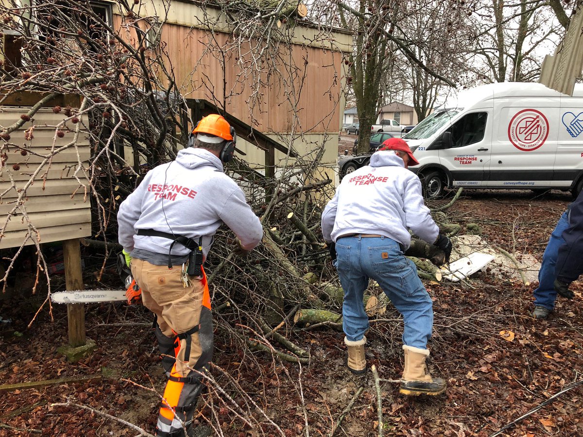 ConvoyofHope's tweet photo. After a night of high winds and pelting rain, a Convoy of Hope #Disaster Services team has been out helping families clean up debris. https://t.co/Xm70V5JQxQ