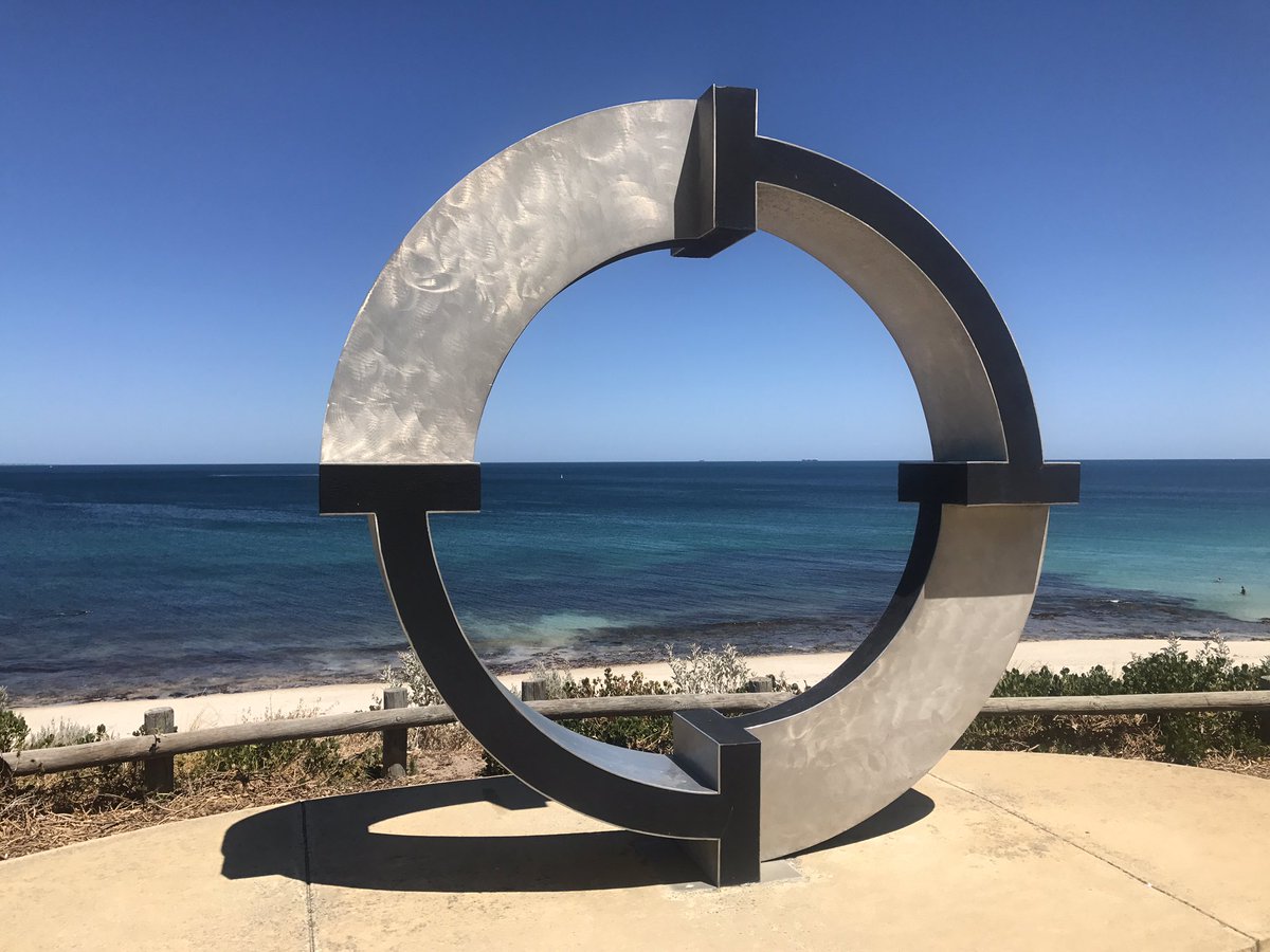 JennyOttaway's tweet photo. I love this sculpture, looking out to the ocean. A divine circle. 

People posed sitting inside it or standing with the sea before them. 

Me, I took my shot plain and simple; not wearing my 👓, tho. 

Got home and noticed the symmetry of the circle with the horizon. #flukedit https://t.co/2g1IvTdJTw