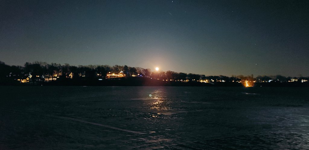 Papablast's tweet photo. It's cold as heck out but the night sky with this full moon is so beautiful. Also Yes I am driving on water and I captured a shooting star in this picture 🌠 #papathought https://t.co/6uFkSeFcy4