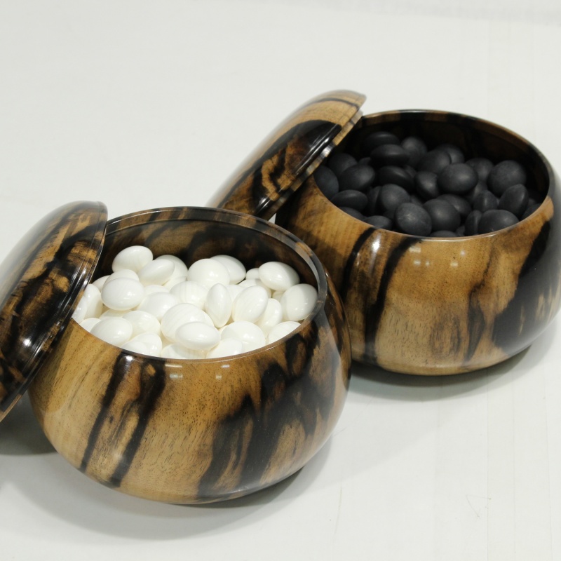 WorldOfGo's tweet photo. 黒柿 - black persimmon is a truly rare and beautiful material. It is extremely difficult to handle this wood, as it may often result in cracking during the drying process (which should last many years).

You can get them for about $4,400 (480,000 yen) - https://t.co/wfdgUa4kzR https://t.co/tNlulM3IAg