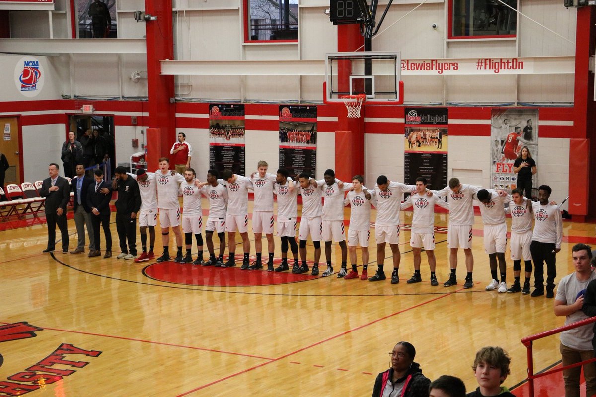 AmyMccombs's tweet photo. Yesterday @LewisMBBall defeated William Jewell 76-51. Follow link to album of pics. @LewisFlyers @Anthonydava33 @APischke12 @oliver0421 @GrandeRojo31 @Drebell_22 @jake_reinhart30 @mjpforthree   #FlightOn. https://t.co/7UkKckLnsx https://t.co/x40JxpdFa3