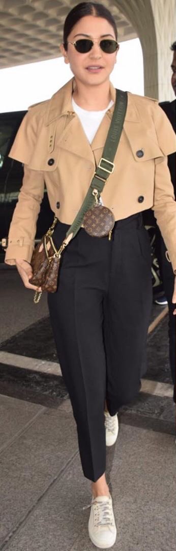 And then after a little break Anushka Sharma is back with her airport looks. Can she ever go wrong when it comes to airport looks? I dong think she ever can. The trench crop coat and that cute bag. Her glowing skin. She looks like a stunner she is.