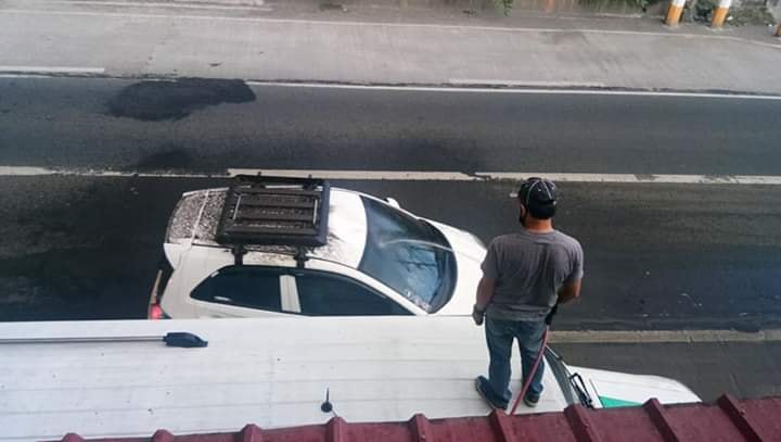 latest_chika's tweet photo. Nice one, Kuya! 👌

LOOK: A man from Brgy. Talaga, Tanauan City, Batangas took the initiative to sprinkle water on ash-covered cars passing by their house as he cleans his own vehicle which was also affected by the ash fall from the Taal Volcano eruption on Sunday.

📸 Marj Jorie https://t.co/tA3irLj90b