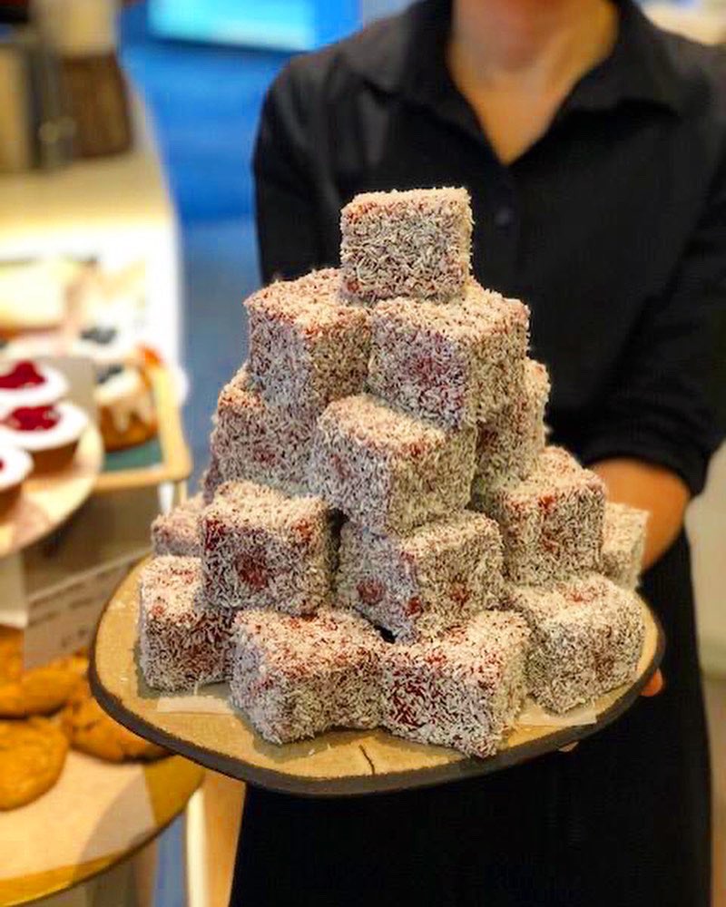 ottolenghi's tweet photo. Lamingtons at all the Ottolenghi locations - and proceeds donated to Australian Red Cross that helps people affected by the recent wildfires. Come and get ‘em. https://t.co/rVAmrUs6Pm