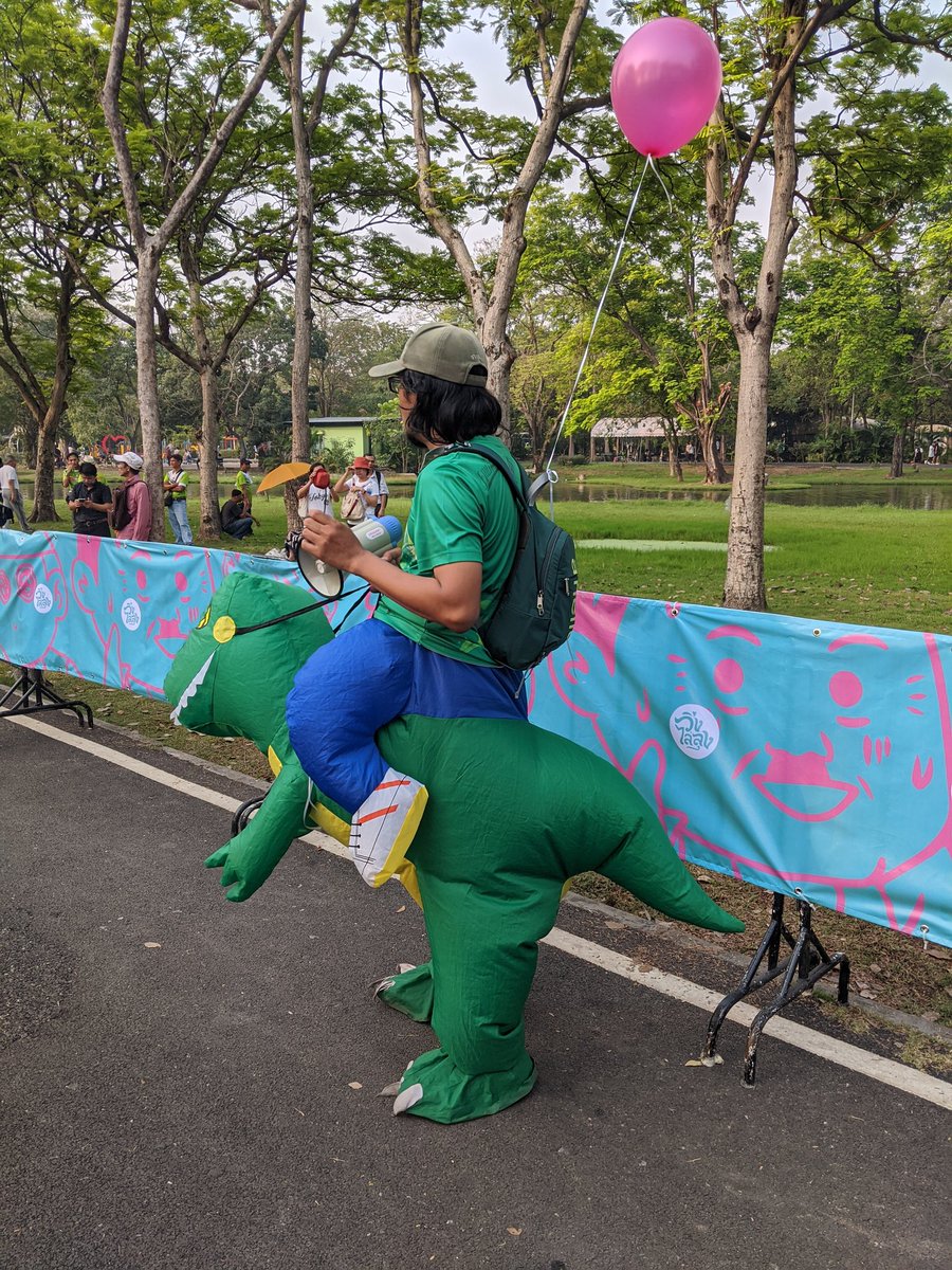 punkypinky's tweet photo. Colorful Dinostaff at the #RunAgainstDictatorship #วิ่งไล่ลุง https://t.co/8inX580Vb5