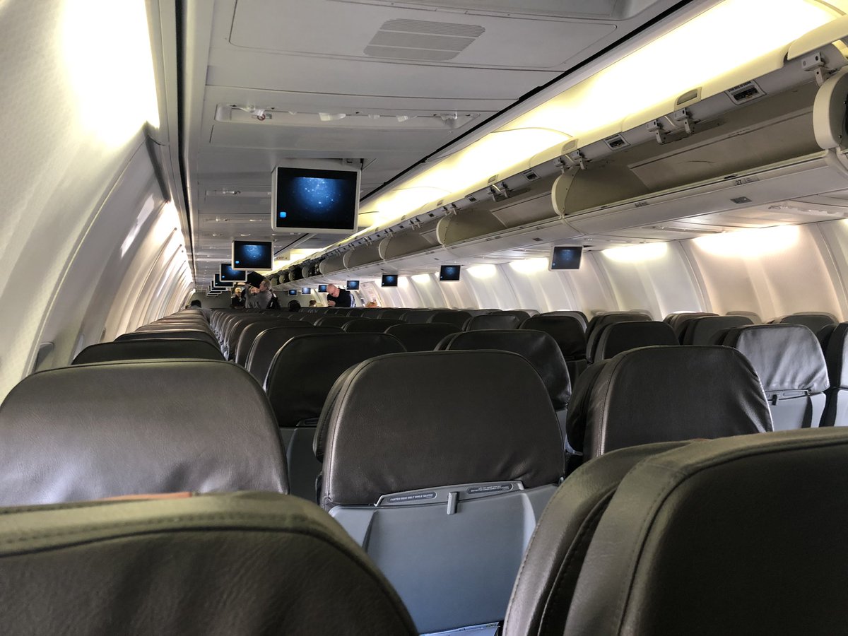 iTweetTurf's tweet photo. One of the first to board and will be LAST off of this plane. #row30 at least I can get a @WoodfordReserve on the rocks in the air. #๐ฅ https://t.co/O1MsldVChm