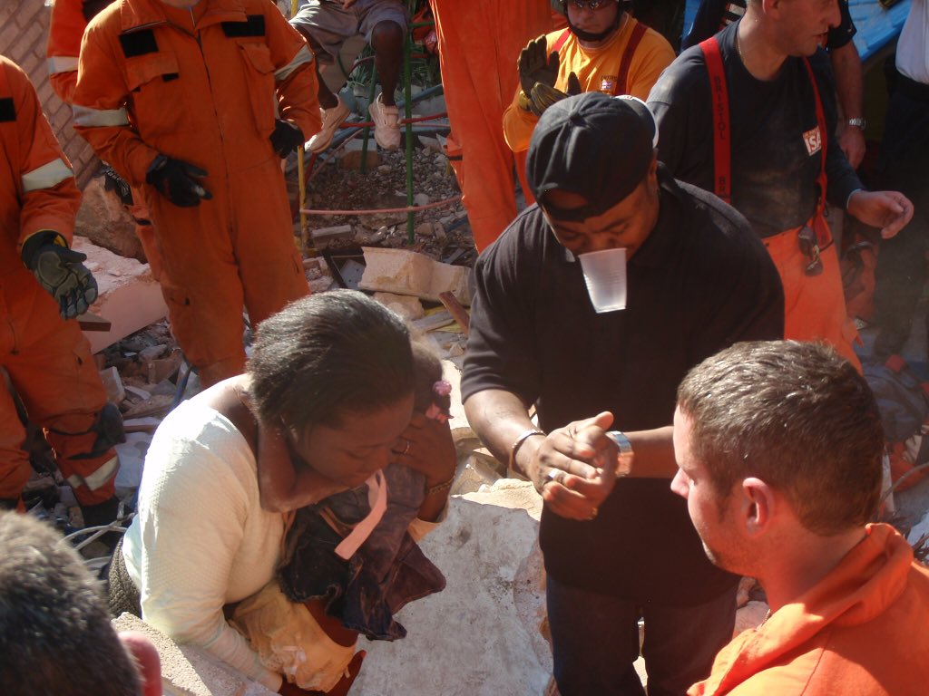 UK_ISAR_TEAM's tweet photo. Two-year-old Mia was just one of the people our team pulled from the rubble of the #HaitiEarthquake ten years ago. We rescued her from a collapsed kindergarten where she had been trapped for three days.
🇬🇧#UKAid @DFID_UK 
#ThinkingOfMia #Haiti10 https://t.co/fI4BNN7aYm