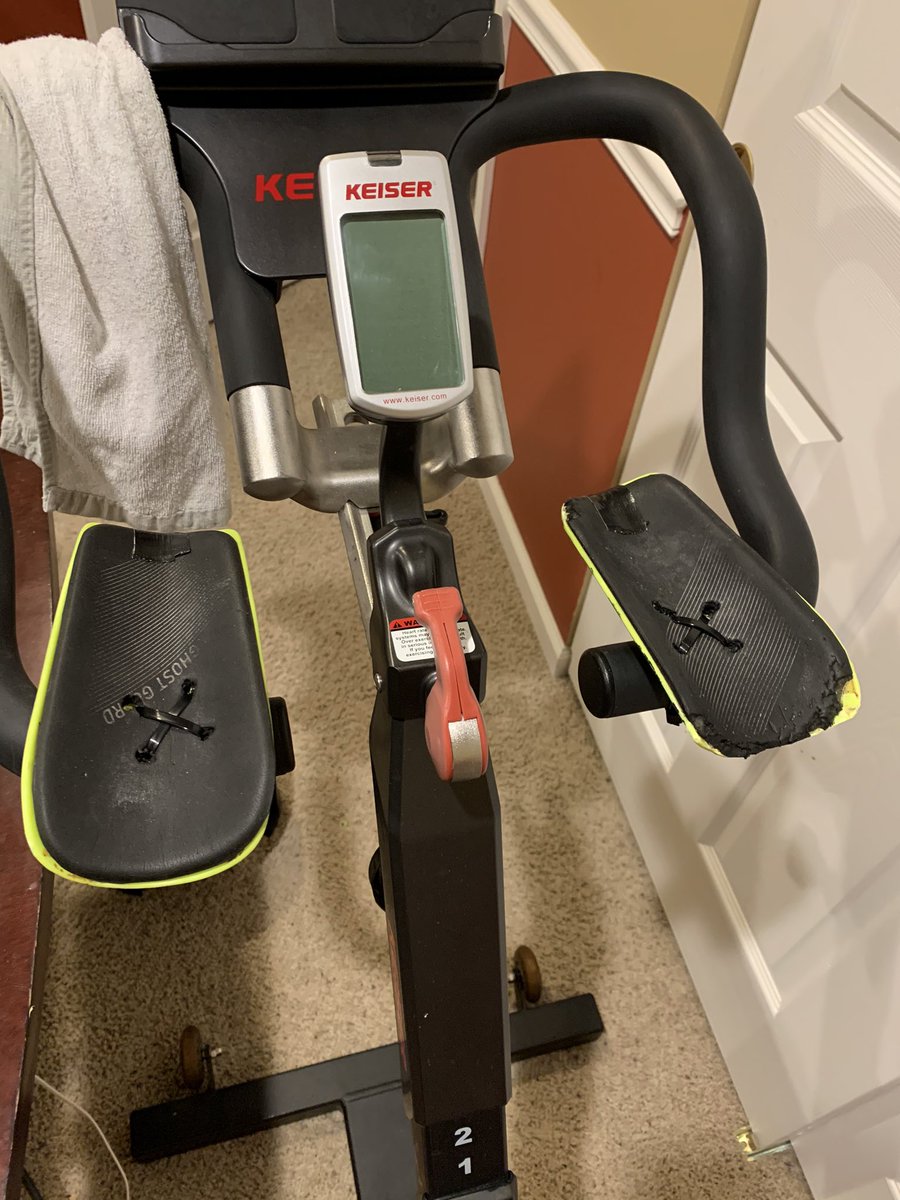 Too cold to bike train outdoors for Ironman Texas, so I installed aerobar pads on my #keiser m3i spin bike using soccer shin gaurds.  Whatever works, right??  #podiumorbust <a href="/IRONMANtri/">IRONMAN Triathlon</a>