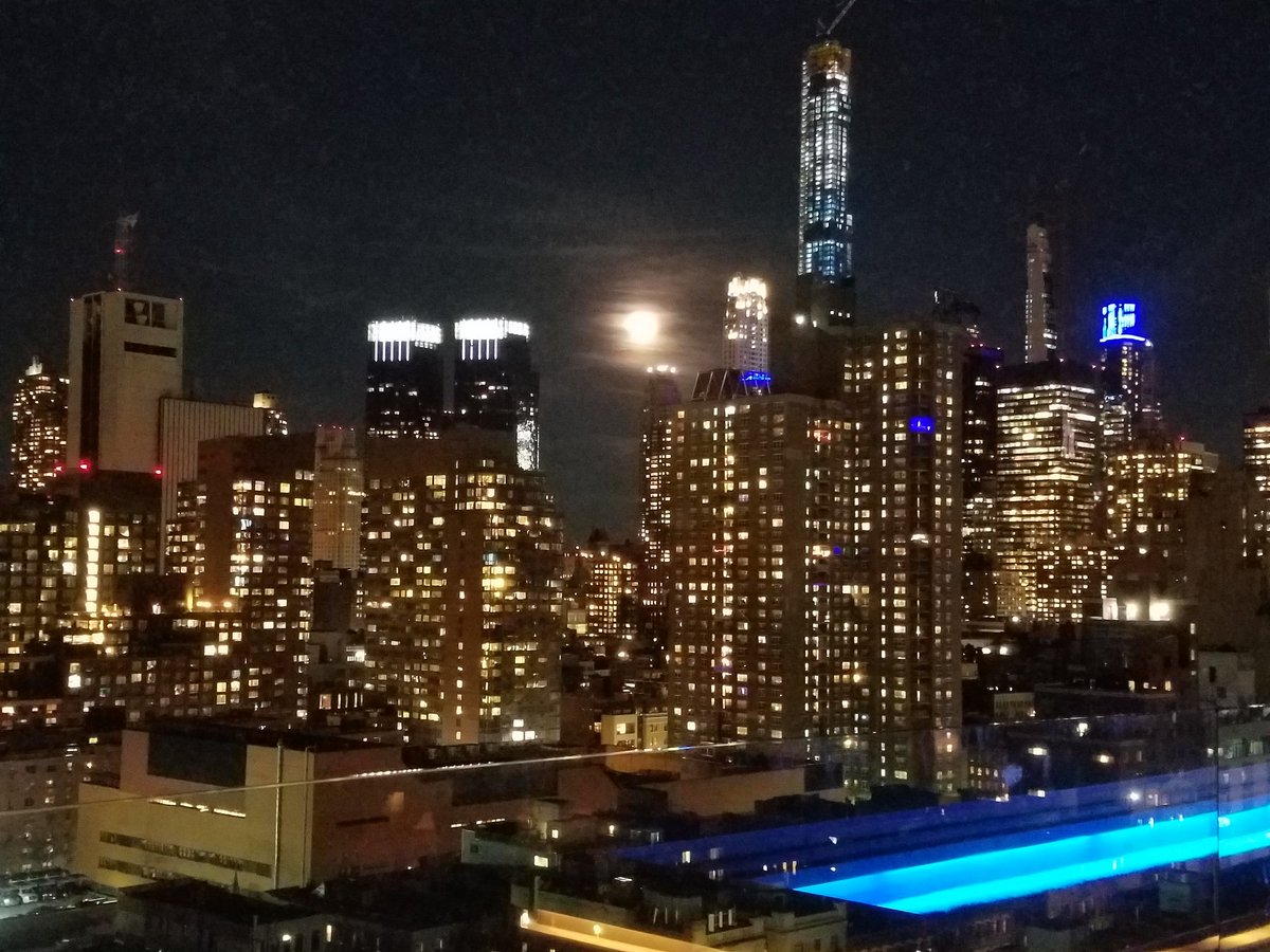 DBerthiaumeCSA's tweet photo. Full moon over New York. View from #PressLounge #Flooid party https://t.co/huKajBvDTF