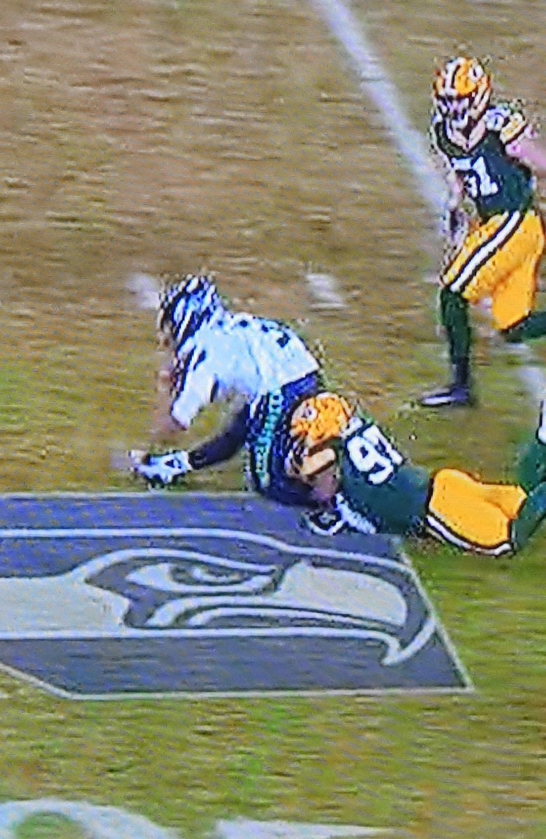DACOWBELLMAN's tweet photo. Russell Wilson lucky he didn't get hurt wow. #SEAvsGB https://t.co/Qykpm7pvwf