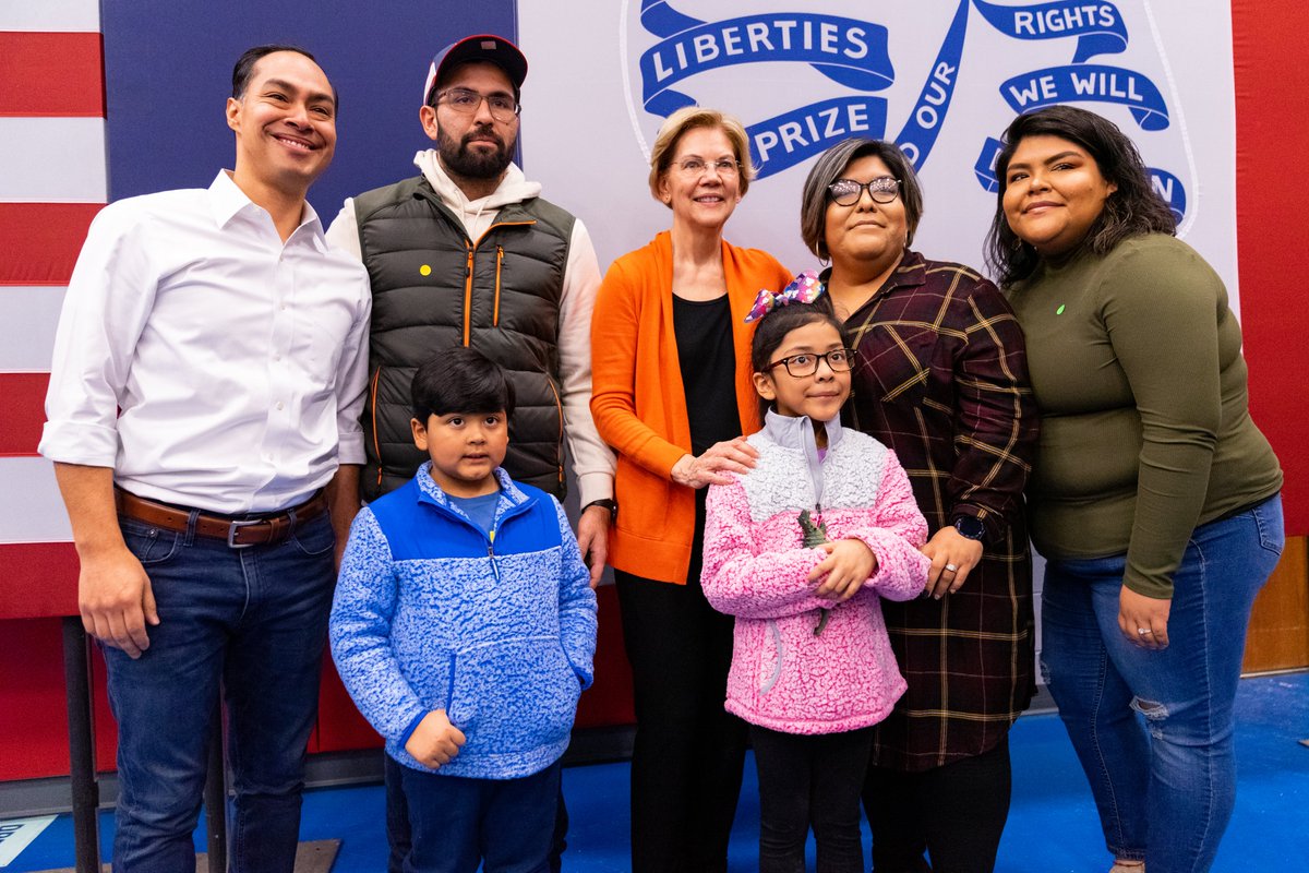 Elizabeth Warren takes a photo with supporters at the Marshalltown town hall.