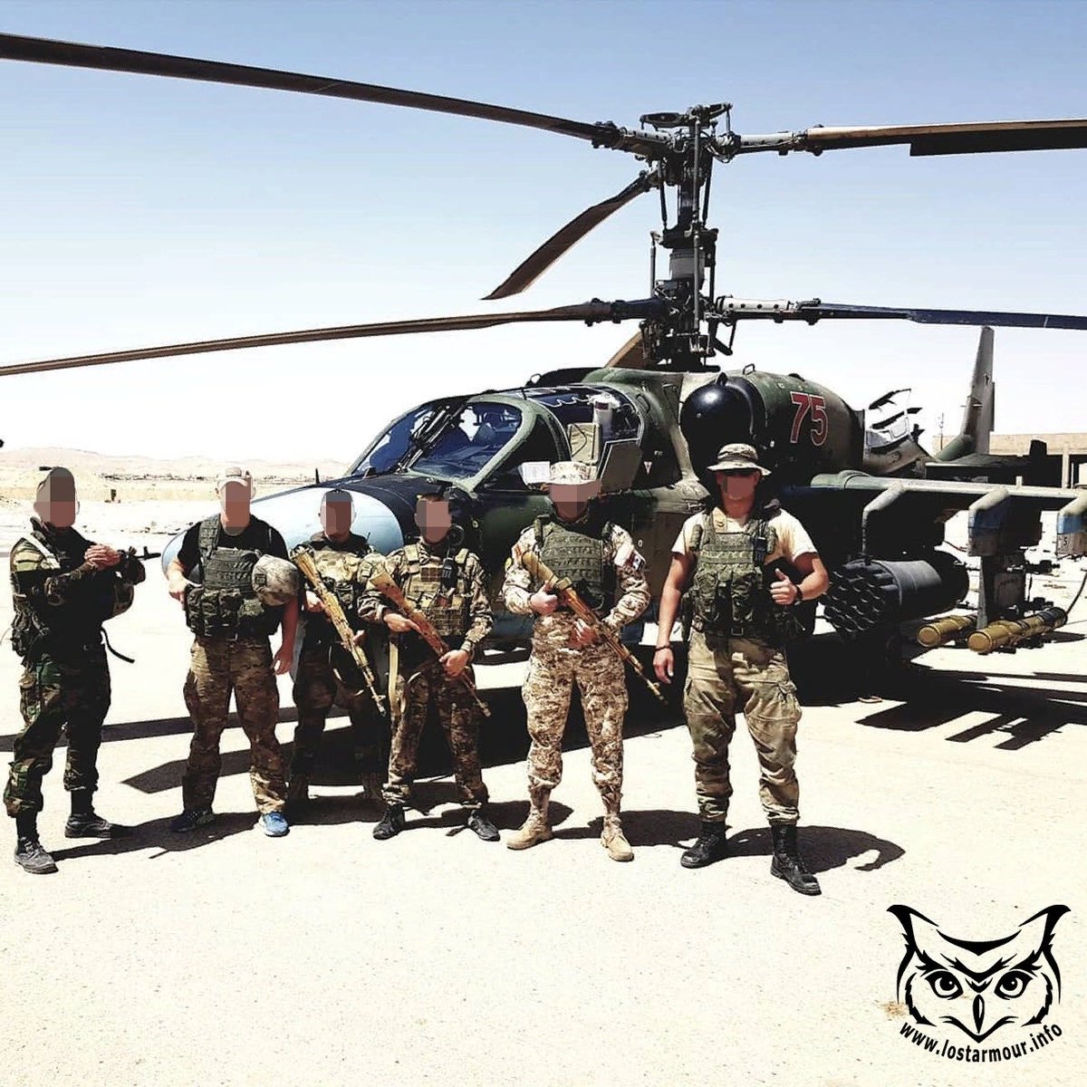 Russian spetsnaz or razvedchiki in front of a Ka-52 helicopter (red 75) in Syria. The Ka-52 has two Ataka ATGMs equipped and a B-8V-20 rocket pod. 29/ https://vk.com/russian_sof?z=photo-138000218_457266389%2Falbum-138000218_00%2Frev