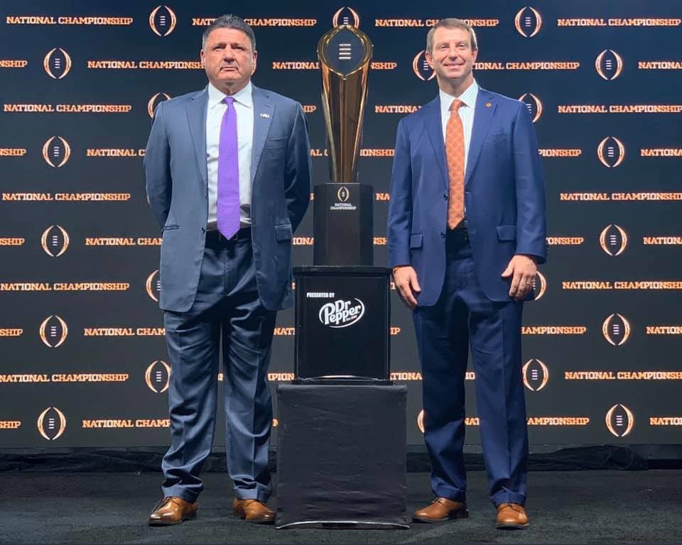 james23408817's tweet photo. Somebody get Coach O an iron for them pants. 

I’ll take a shot in the dark and say that Coach O doesn’t wear a suit very often. https://t.co/7JSAlx9Lyo