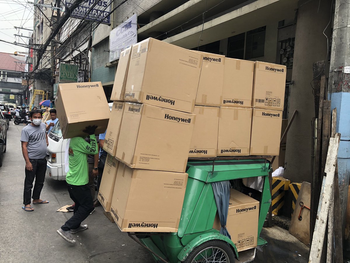 GMA News on Twitter "A tricycle overloaded with boxes of N95 masks is