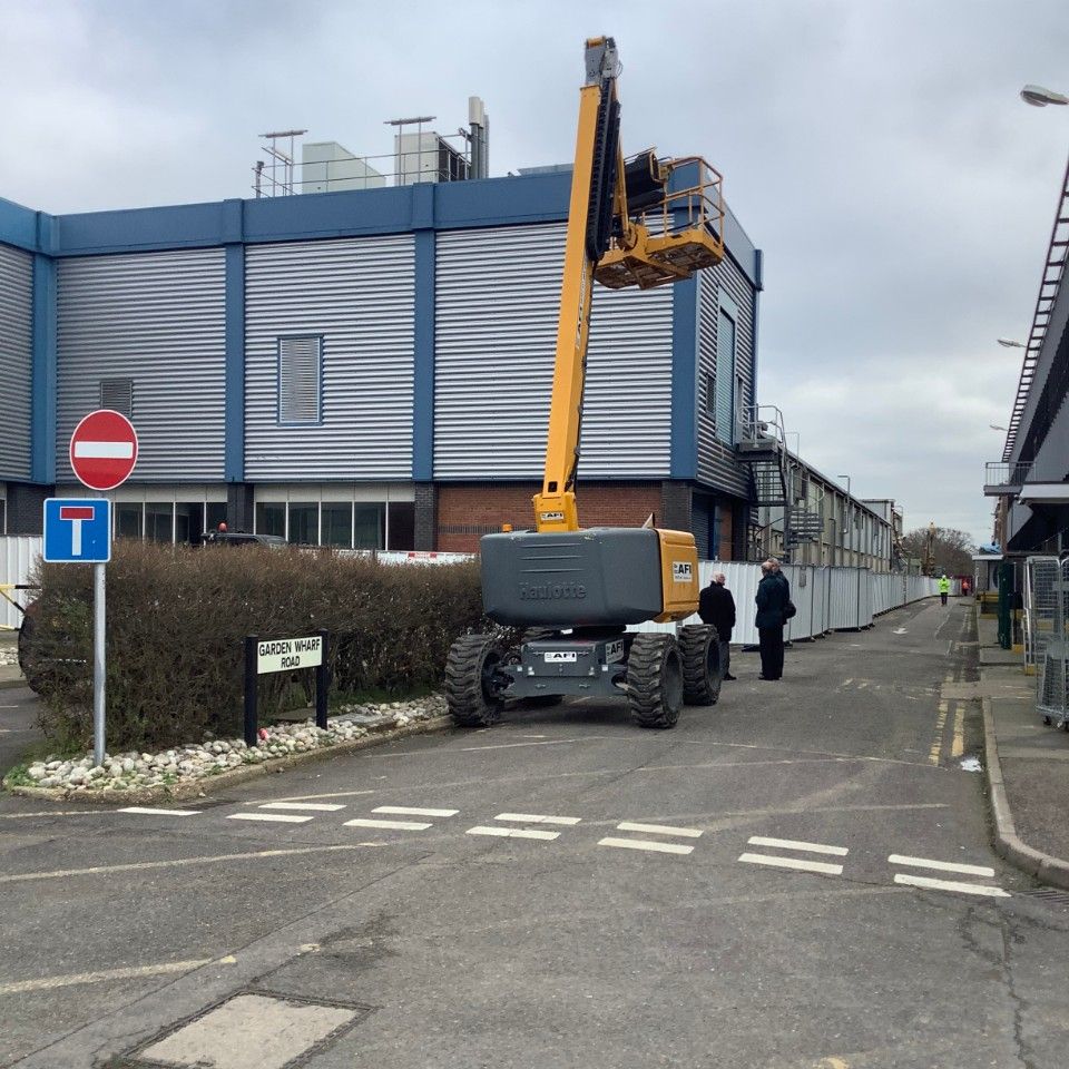 A cherry-picker in front of the PEARL site at Dagenham East.