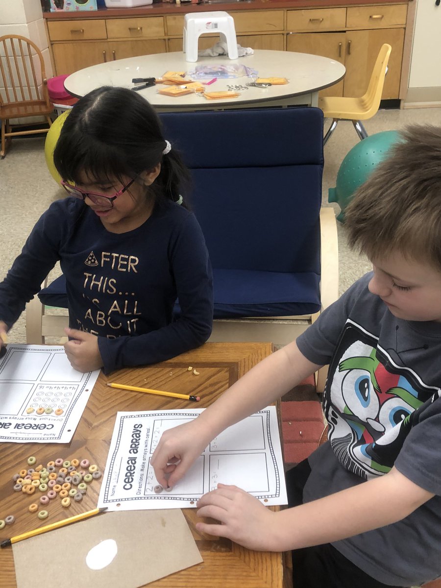 Mrs_Ps_class's tweet photo. We love eating our math! Fruit loop arrays. @TBCDSB_Hornets @tbc_schools @OECTAProv #grade2mathfun https://t.co/KEUzPUHQAT