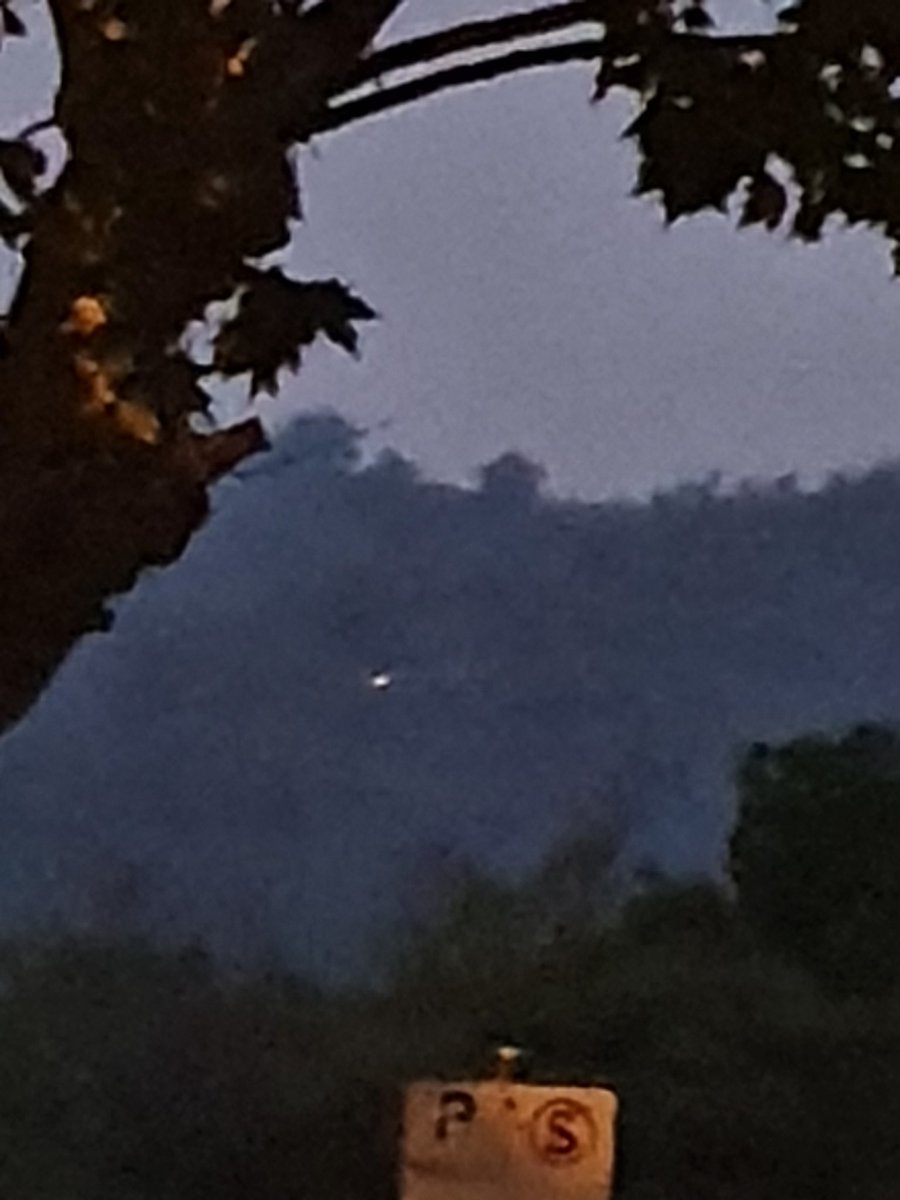 Barbara91046379's tweet photo. I took this photo earlier tonight,  the hill is on fire again https://t.co/He0Gw5aA2l