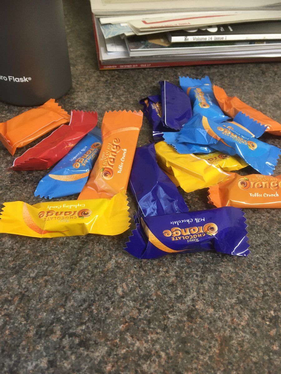 glassbasics's tweet photo. Proper sales rep. Orange pads, orange boiler suit, orange bucket full of chocolate orange segments 😊 #OfficeBribery #BringFood #WeLike https://t.co/cUohovWcwn