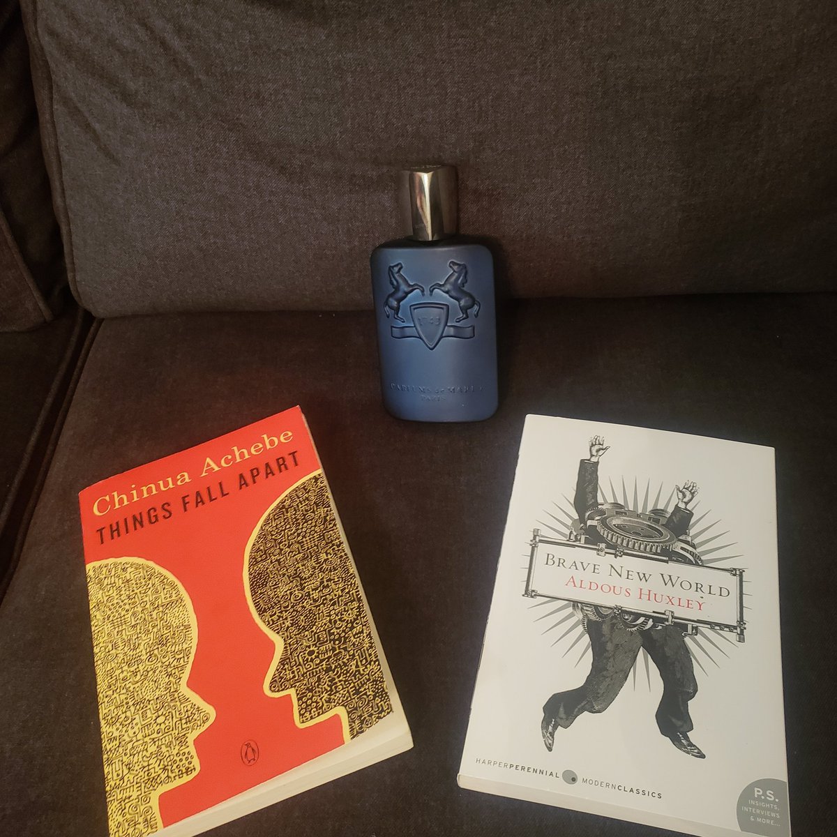 Zaki_80's tweet photo. Peace and blessings kinfolk! My Mom is an author, so, reading is important in my book (pun intended) Bout to finish up the classic on the left...then dive into the classic on the right. Smelling good whilst I do it. Lol #books #reading #layton #parfumsdemarly #yeenknow https://t.co/vkNb2RhU3M