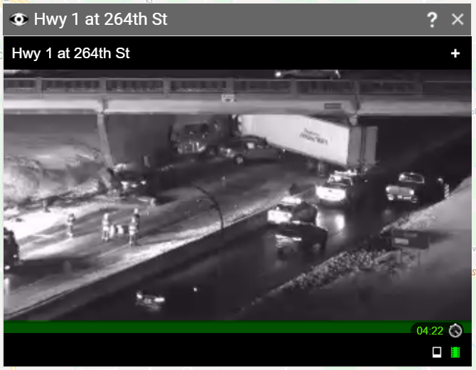 DriveBC's tweet photo. #BCHwy1 at 264 St in #LangleyBC, jacknifed semi is wedged under the overpass, please avoid the highway in this area https://t.co/1at02KaX4D