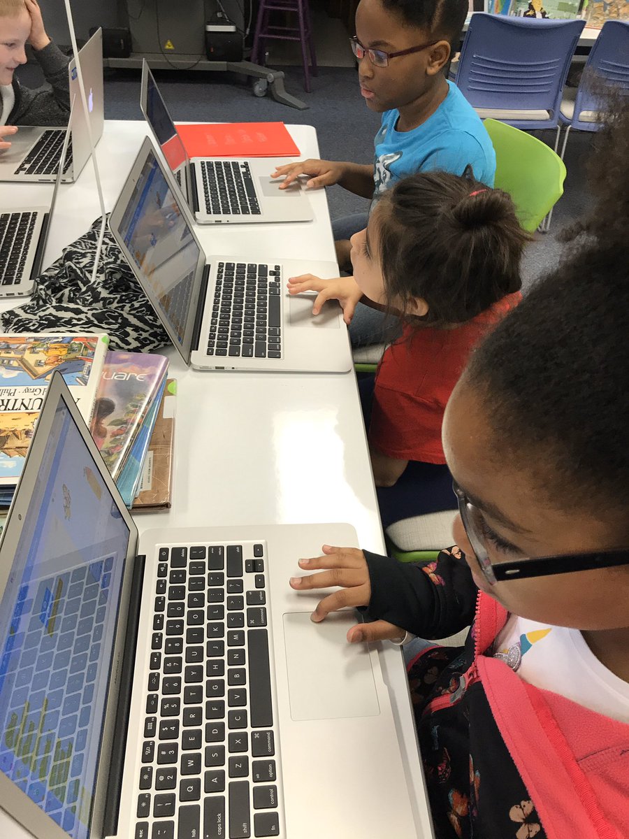 SlaughterLC's tweet photo. I spy 2nd graders coding in the library! 🙌🏼👏🏼 #growthmindset is our community circle focus this week. Coding is a perfect way to apply the power of YET! #SlaughterES @SenaiWalker #prideinside1920 @scratch #kidscancode #hourofcode #mckedtech @mrs_etillett https://t.co/FR4fu02Azd