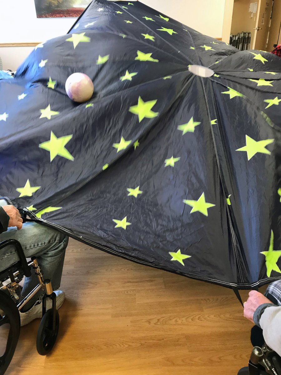 EncoreRehab's tweet photo. ML of Yale residents had a blast while meeting goals in a functional way. The Parachute: A great way for socializing, working on coordination, following instructions, cooperation, visual perception & resistance. How would you utilize the parachute? #EncoreRehab #FUNinFUNction https://t.co/QaXNNFbqo5