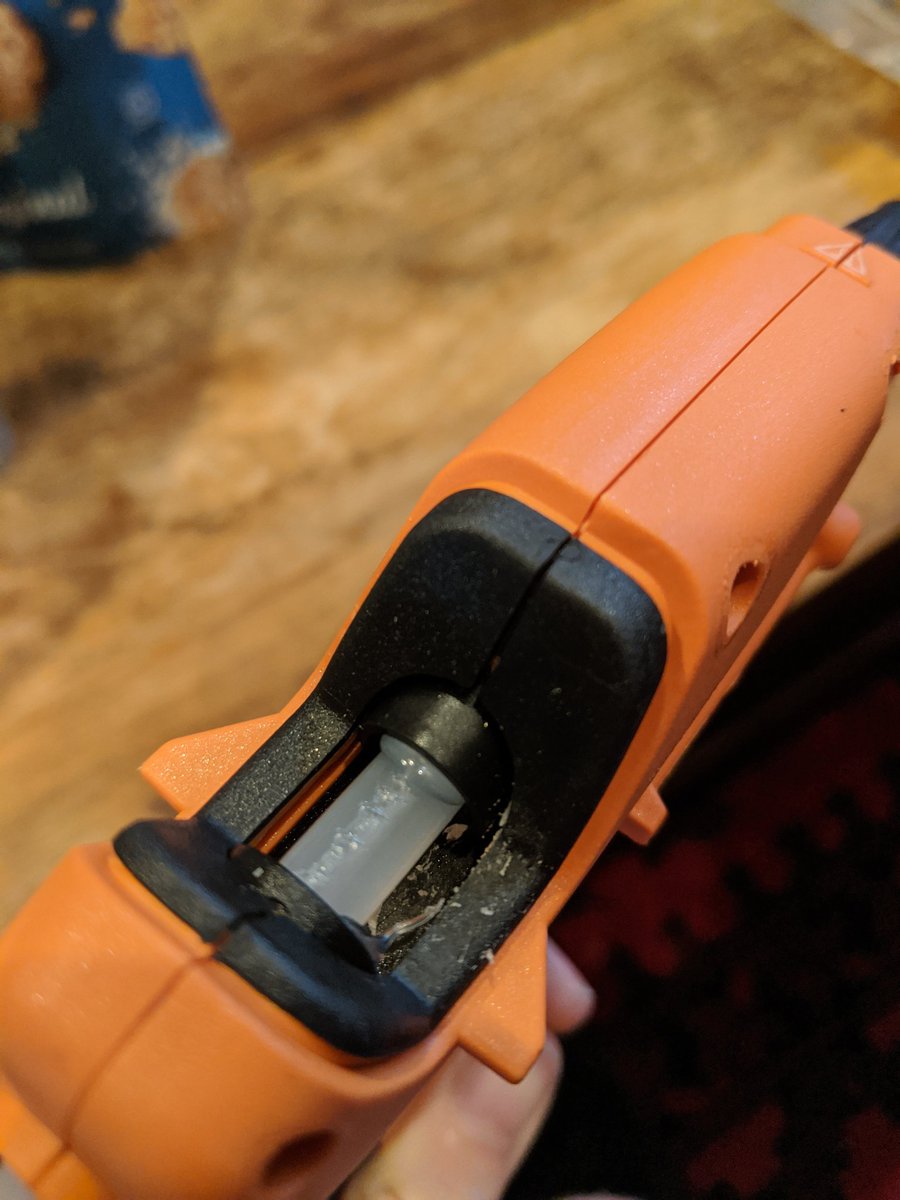 LaserMistress's tweet photo. Got real tired of throwing away brand new mini glue guns because they don't work on arrival, so instead I took this one apart and actually managed to fix it. The coil of wire around the barrel was misaligned, making the glue stick jam. HA! 
#makerwin #fixit https://t.co/KcIOhqeZeJ