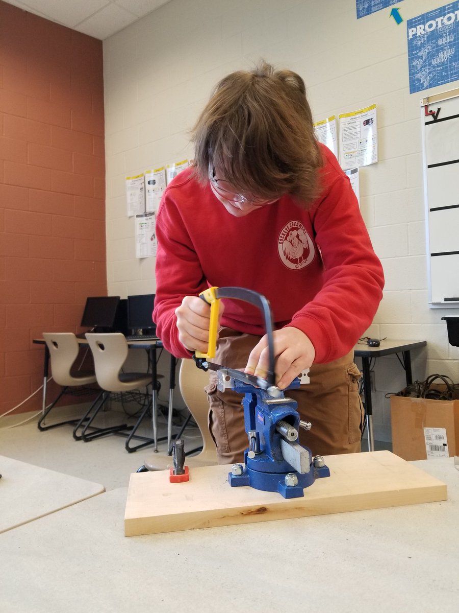 RoboVikes's tweet photo. What do you do when you are on the programming team, want to test a new sensor placement idea, and no one from the build team is around? You grab a hack saw and get to it #RoboVikes #measureonce #cuttwice #omgrobots #tetrixrobotics #FTC #SKYSTONE https://t.co/vur5xoVdW4