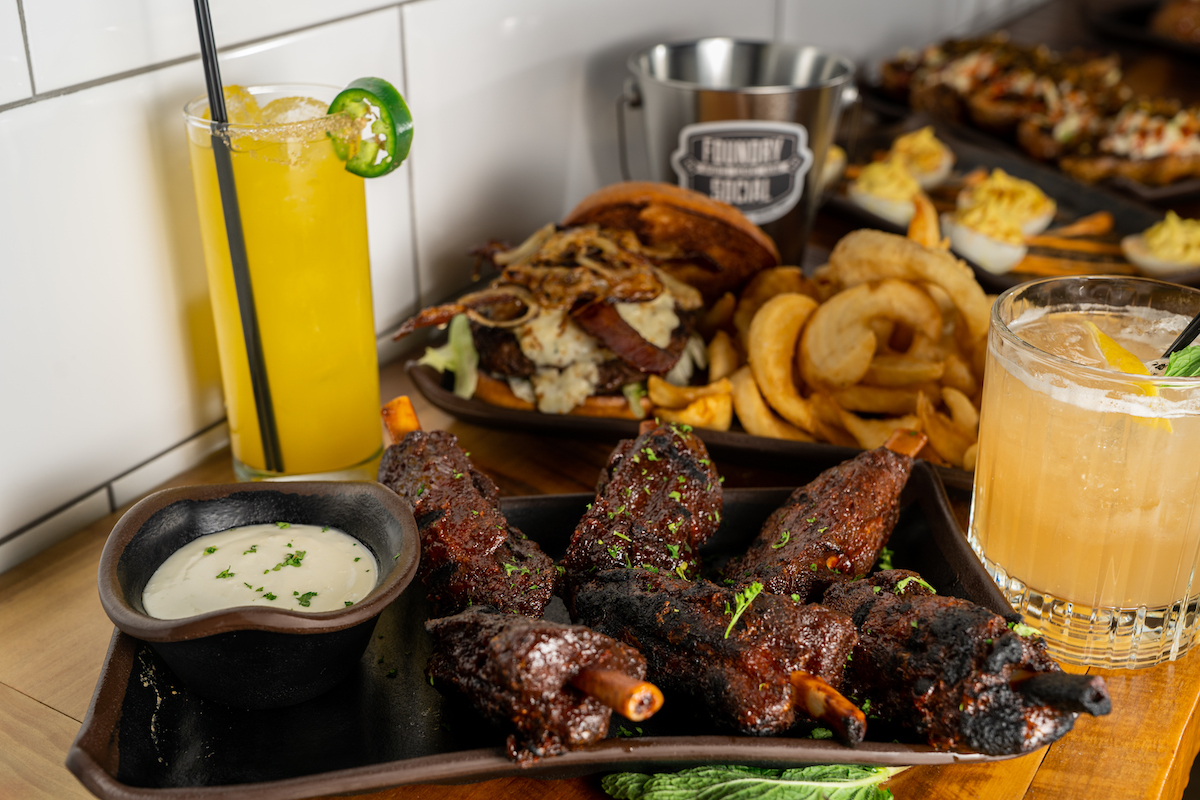 foundrysocialoh's tweet image. At Foundry Social, pigs really do fly! Well, sort of... Try an order of our incredible, shareable ‘Pigs Do Fly’ pork wings! 🐷 These tender pork wings are rubbed and smoked to perfection then bathed in buffalo BBQ sauce and chargrilled for serious flavor! #PigsDoFly #Shareables