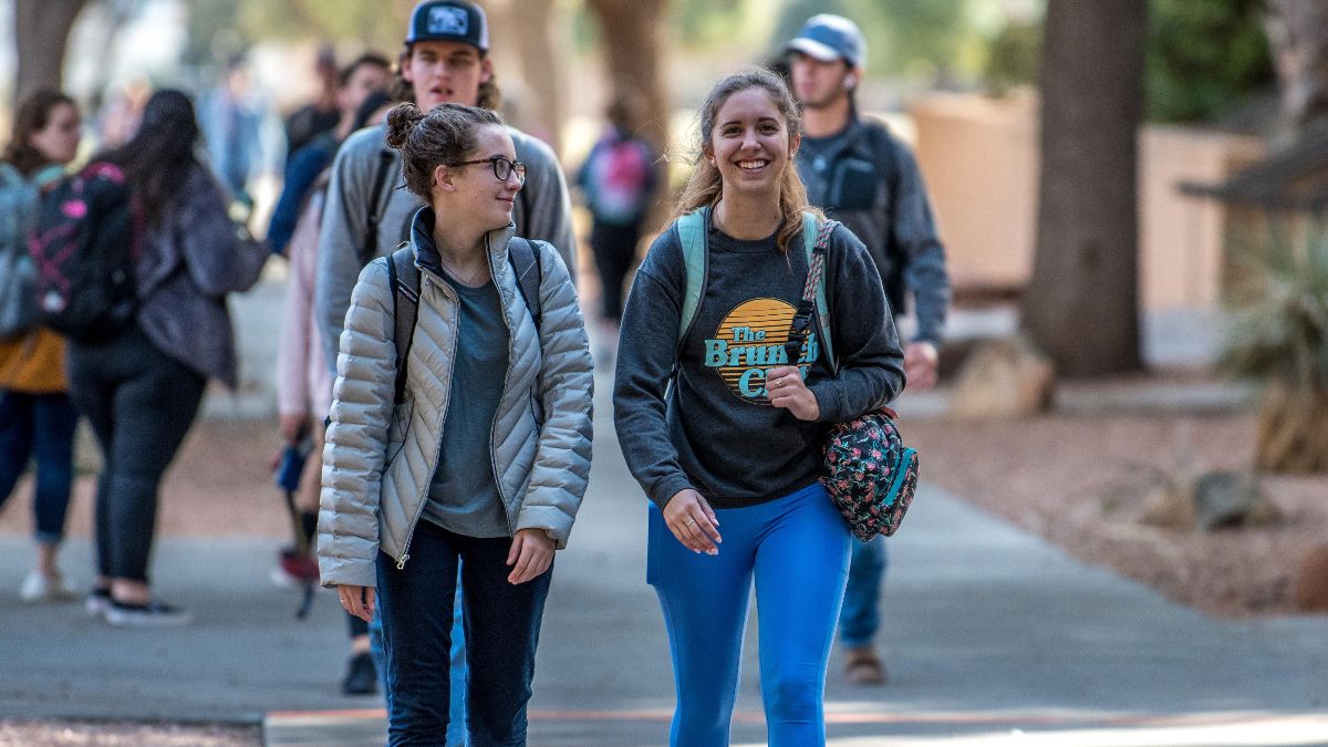 Two female students walking down the ASU mall.