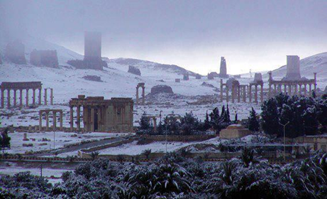 '#Palmyra in the snow'. I've just found this old picture from #Winter2011 I keep in my diary. #TempleofBaalshamin (now damaged), #GrandCollonade (survived), tombs (partly damaged) and palm fronds in a marble calm. In those days nobody could anticipate what would happen next.